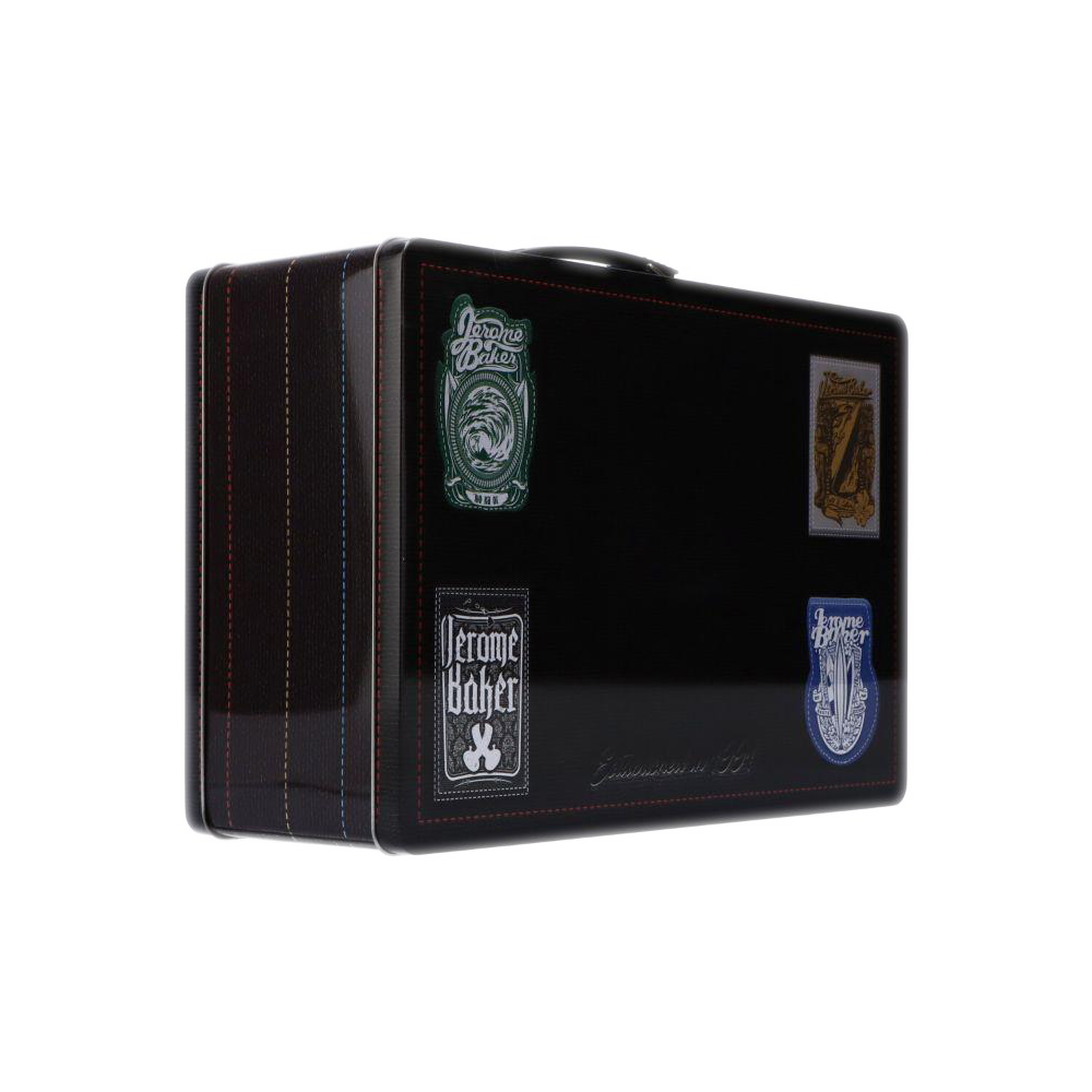 Three-quarter view of a black Jerome Baker Lunch Box with travel-sticker graphics on the front and stitched edging.