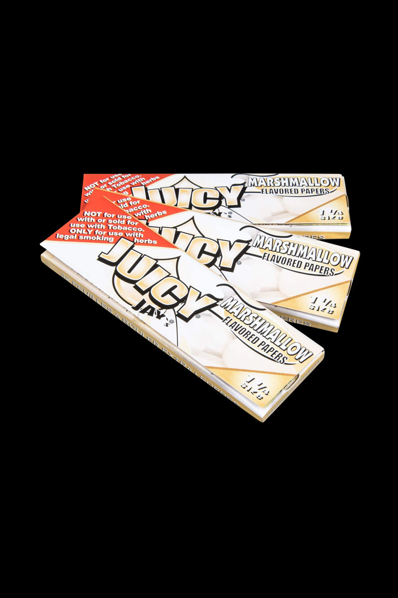A close-up of Juicy Jay's Classic Size Flavored Rolling Papers package with a colorful design and bold lettering against a white background.