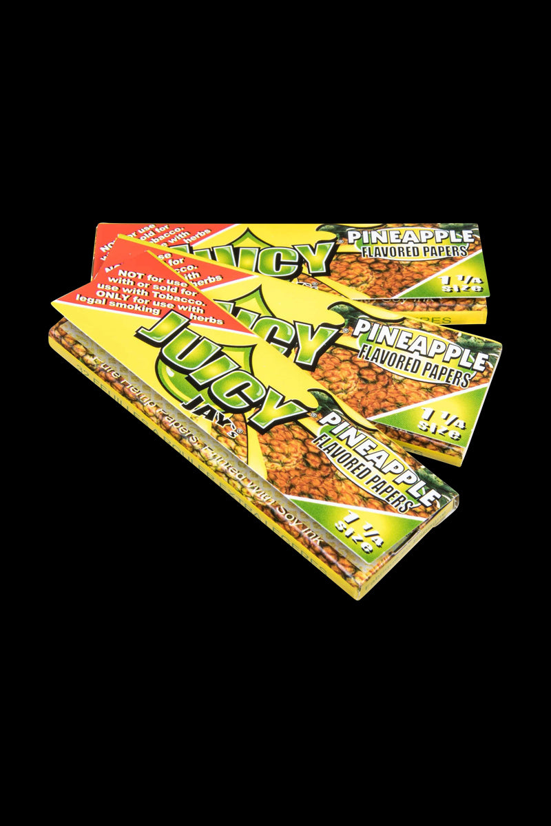 Close-up of Classic 1-1/4" Size Flavored Rolling Papers with a vibrant design against a dark backdrop.