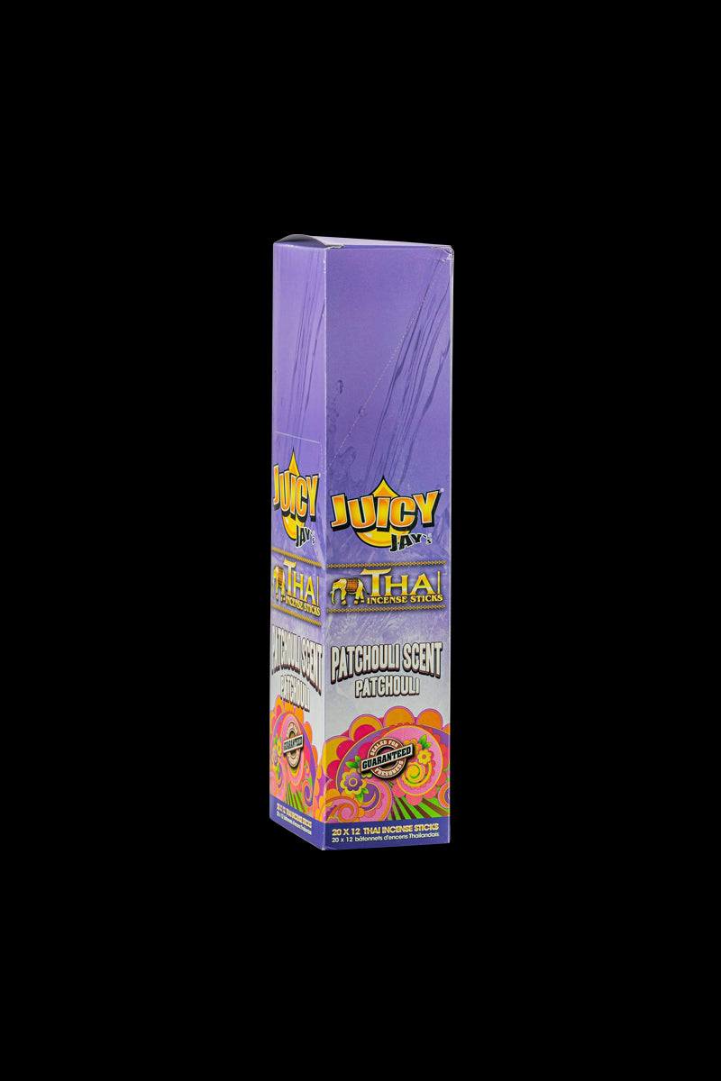 Front view of Thai Incense Sticks packaging with bold lettering and vibrant colors against a plain white background.