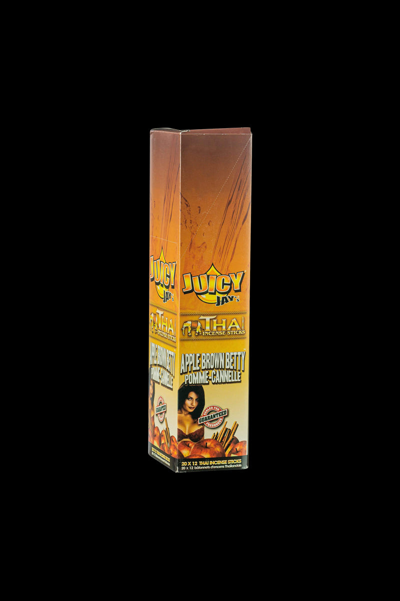 Front view of a package of Thai Incense Sticks, displaying bold branding and text on a vibrant red background.