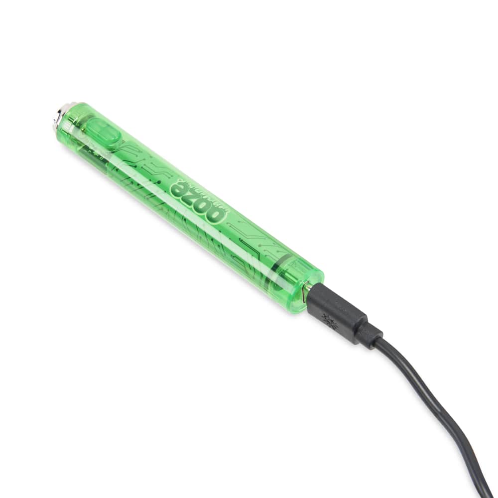 Glowing green cannabis oil vape pen with USB charging cable.