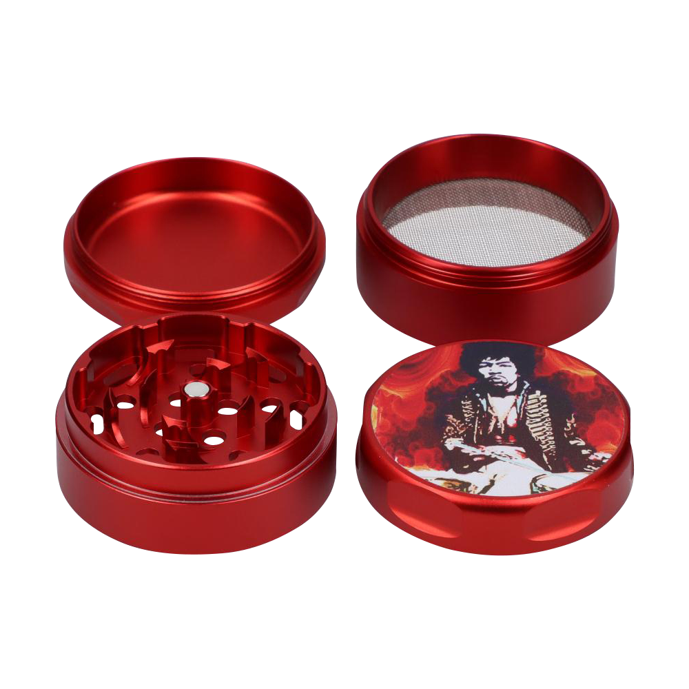 Close-up, angled view of the “Rock Legends “Jimi Fire” Grinder”, a metallic red grinder with a four-piece construction.