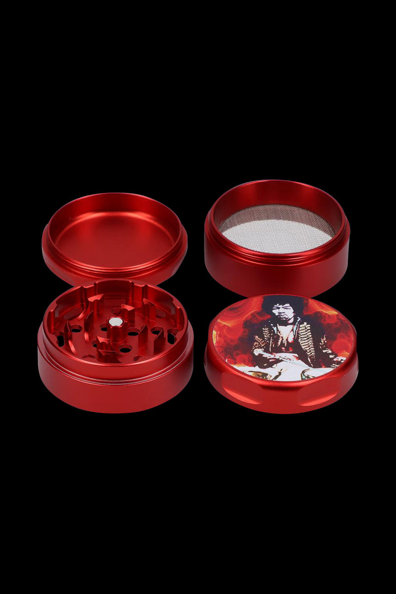 Top-down view of the “Rock Legends Jimi Fire” Grinder, featuring a circular metal grinder with a detailed portrait design.