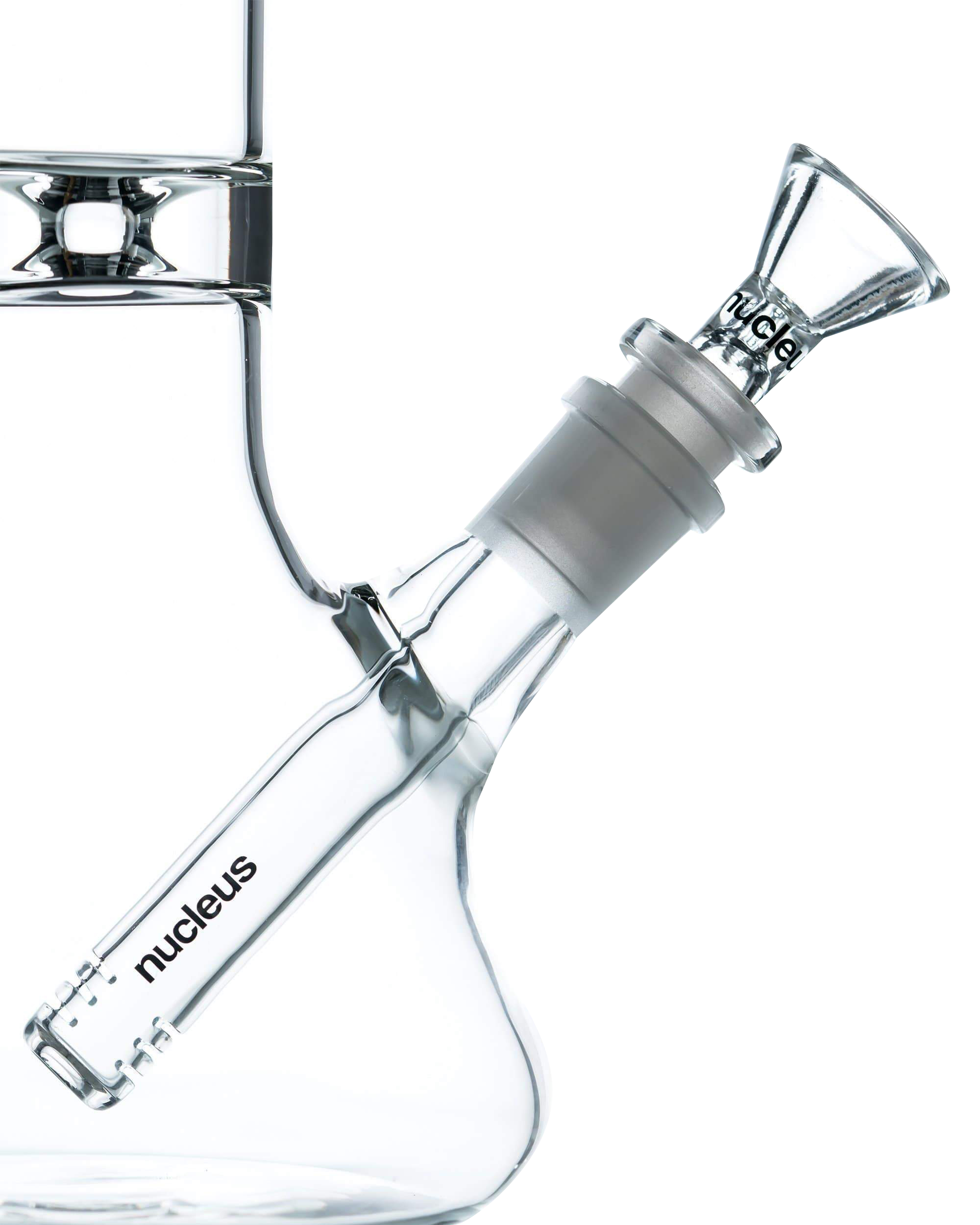 A three-quarter view of the Nucleus 12" Beaker Bong with Donut Style Ice Catcher, showcasing its clear glass construction and wide base.