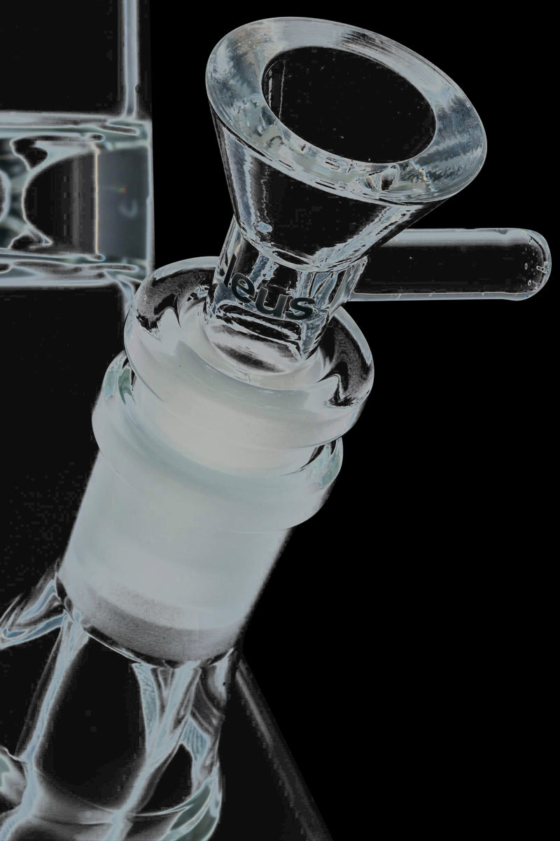 A dramatic, angled view of the Nucleus 12" Beaker Bong with Donut Style Ice Catcher, highlighting its clear glass construction.