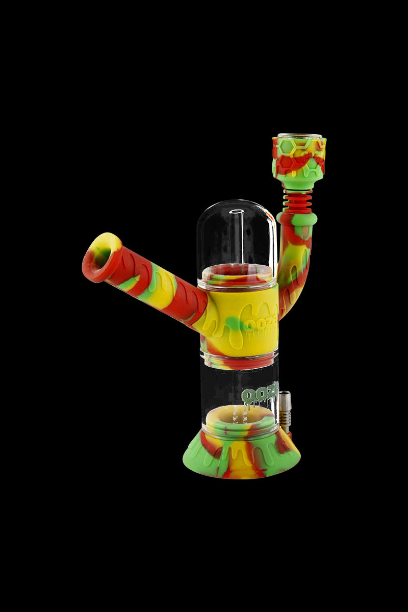 Front view of the Ooze "Cranium" Silicone 4-in-1 Glass Water Pipe, showcasing its colorful, patterned silicone and clear glass construction.