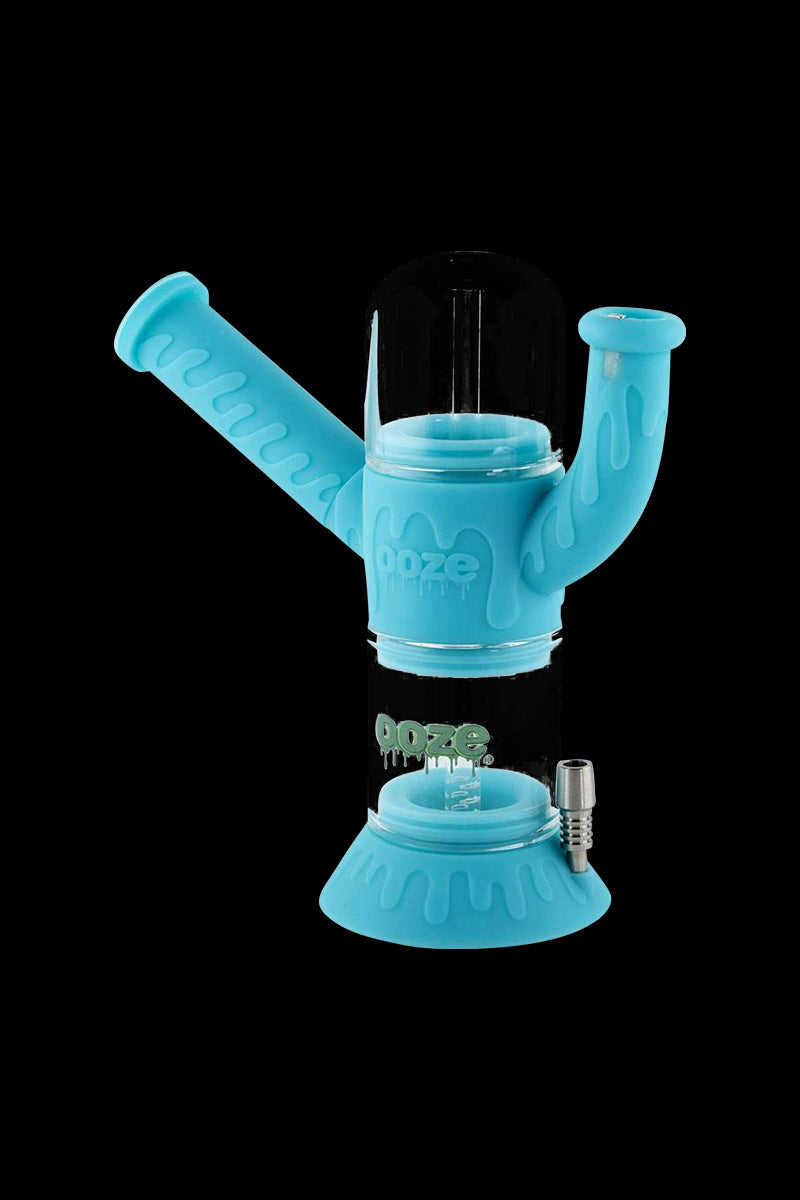 Front view of the Ooze "Cranium" Silicone 4-in-1 Glass Water Pipe, showing the clear glass tube and silicone accents against a dark background.