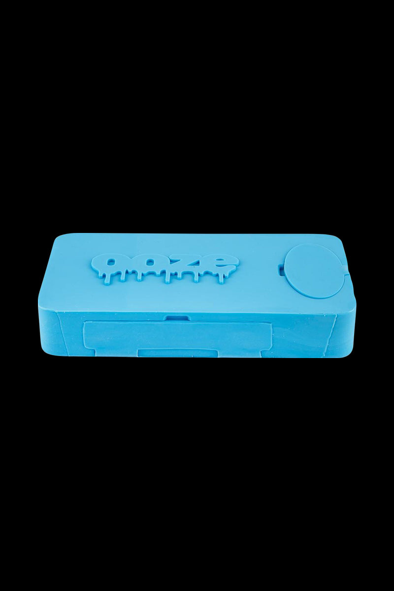 A close-up of the Ooze Slugger Dabbin Dugout, showing its dark, compact design and closed lid against a plain white background.