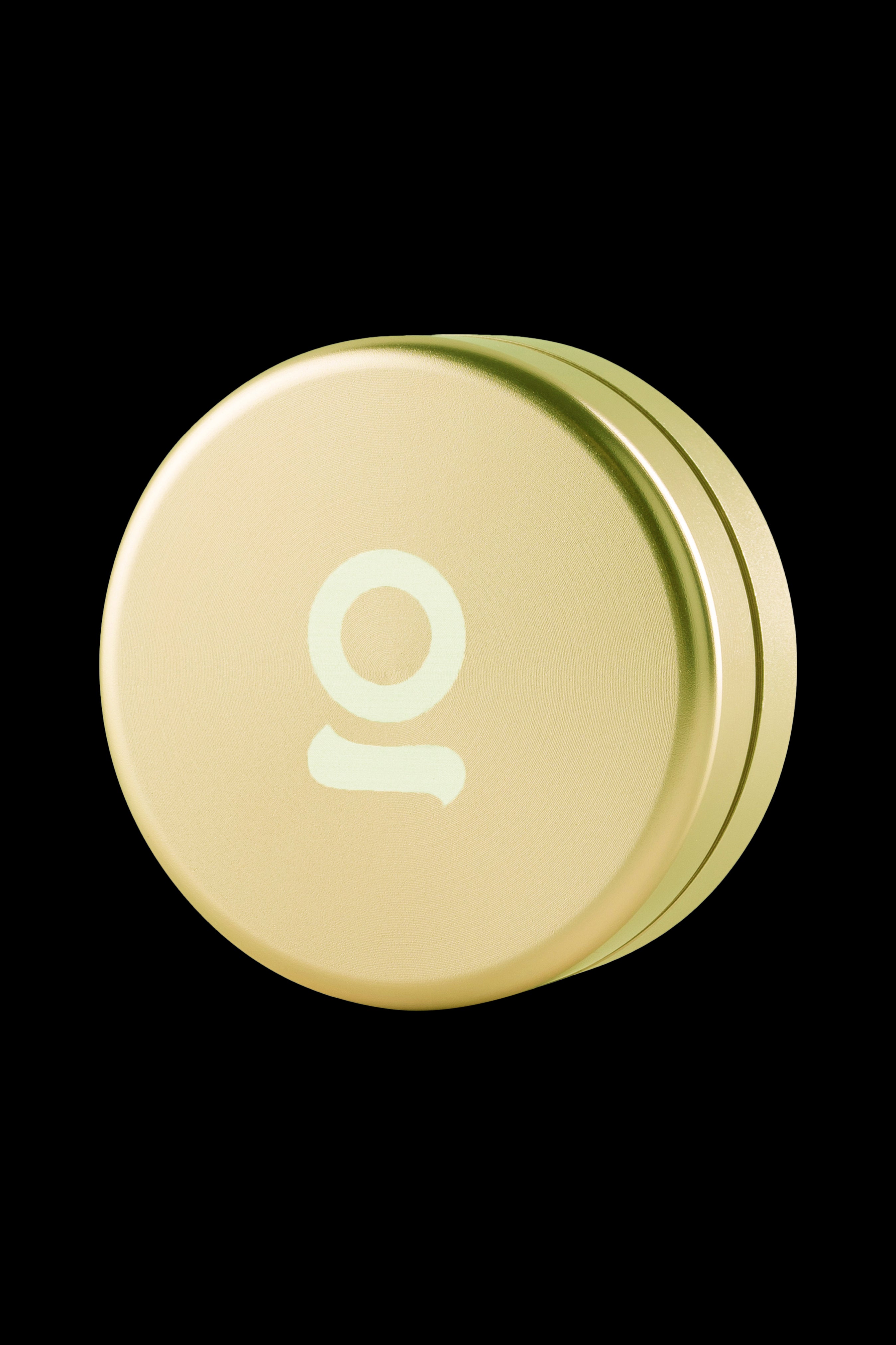 Gold cannabis tin with the number “10” embossed on the lid.