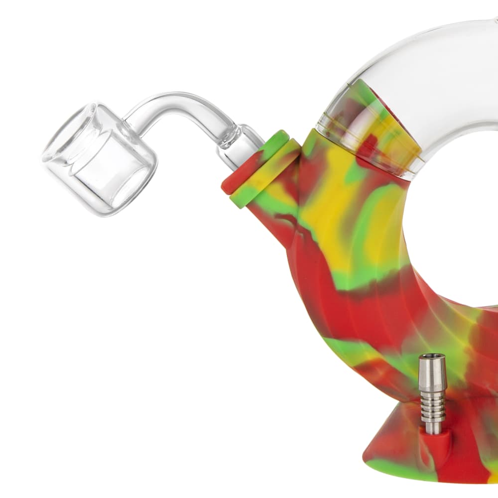 Colorful silicone dab rig with a quartz banger.