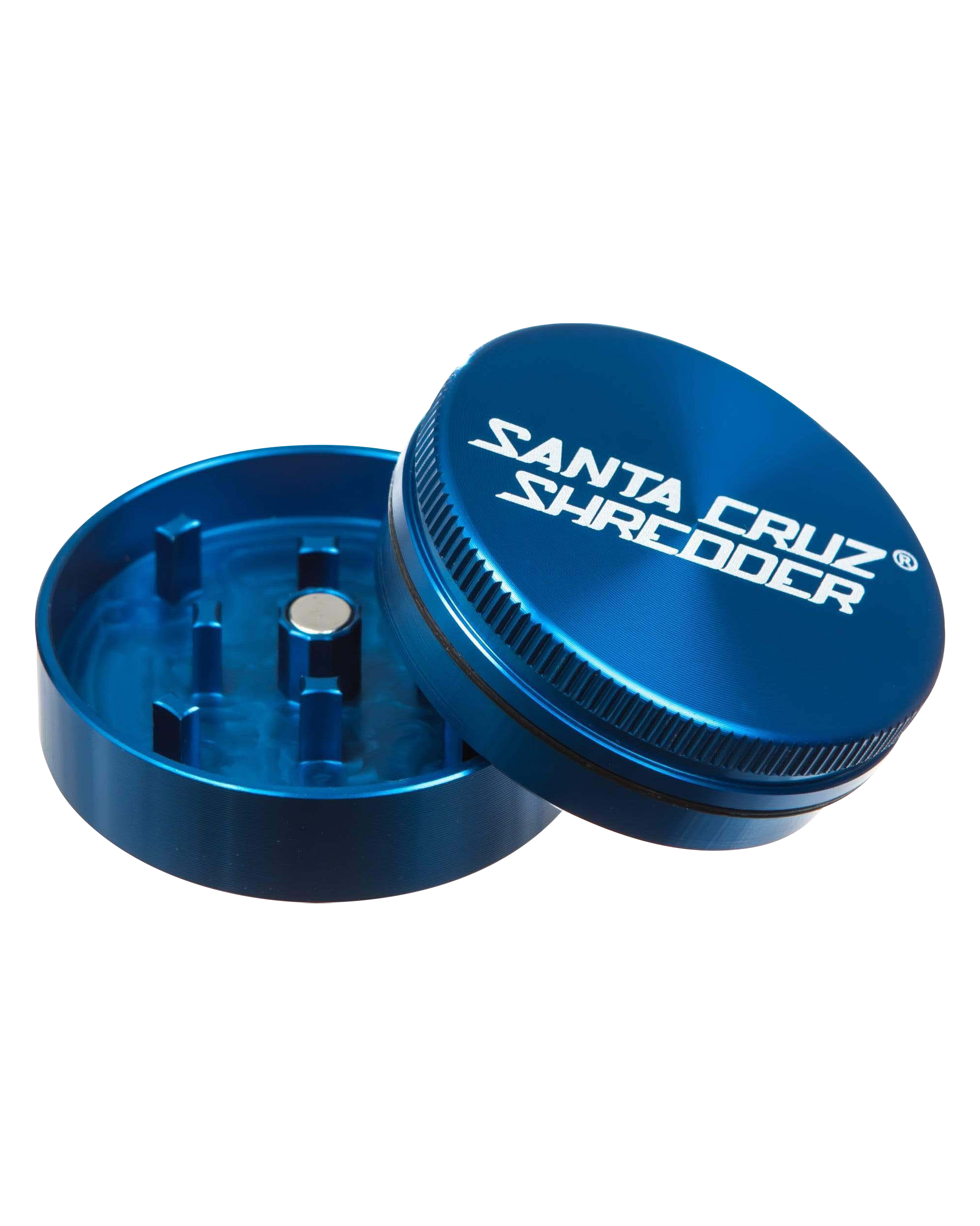 A close-up, angled view of the open Santa Cruz Shredder Small 2-Piece Grinder, revealing its metallic, ridged interior.