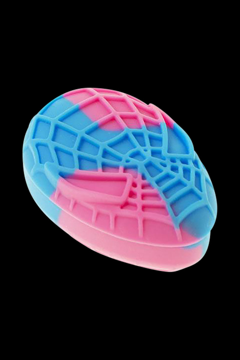 Angled close-up of a pink-and-blue Silicone Non-Stick Teardrop Stash Container showing its textured web pattern against a black background