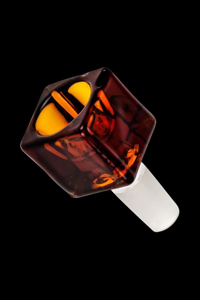 Angled close-up of the Square Glass Bowl - Male Joint showing a translucent greenish-brown square bowl with amber reflections against a black background.