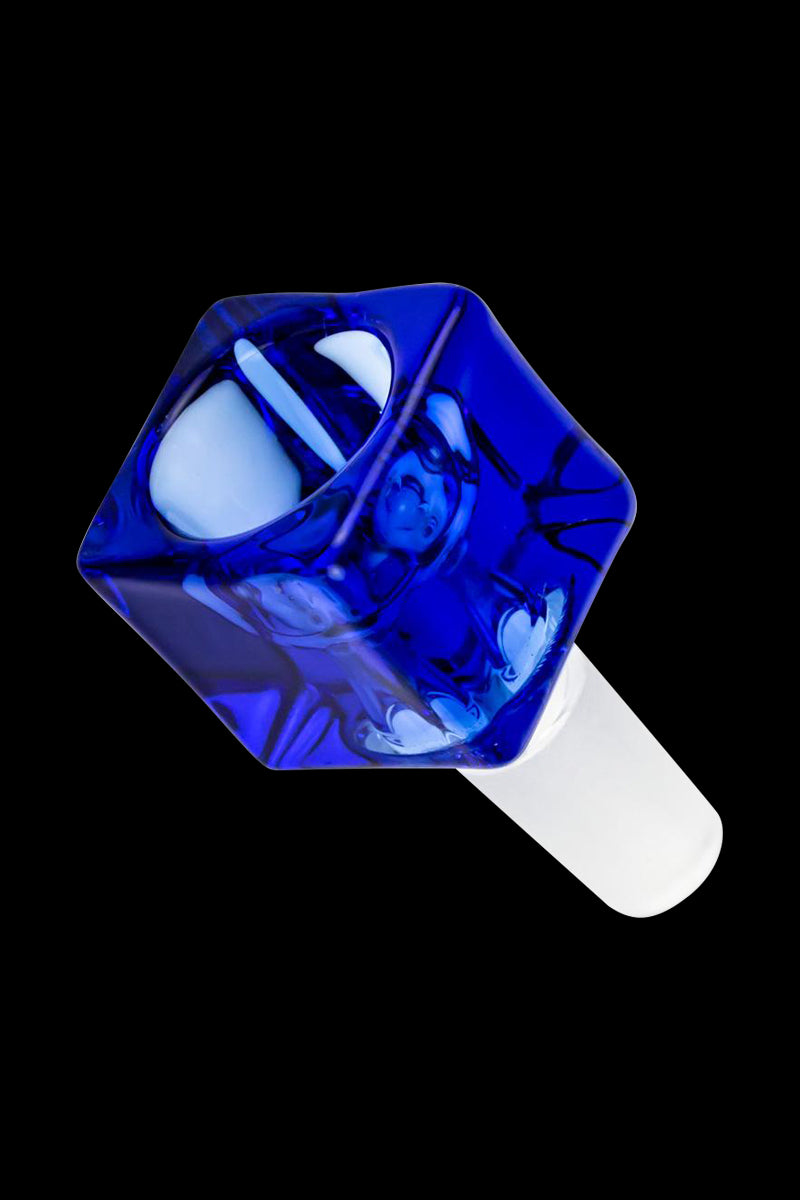 Angled close-up of a clear Square Glass Bowl in deep cobalt blue glass against a black background, showing glossy facets and a white stem.