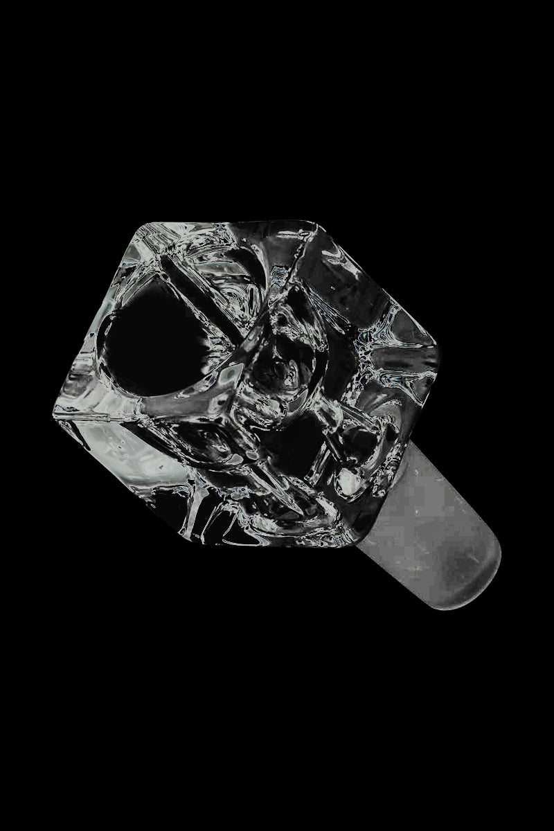 Top-down close-up of the Square Glass Bowl showing a faceted clear glass cube with a round bowl cavity against a black background.