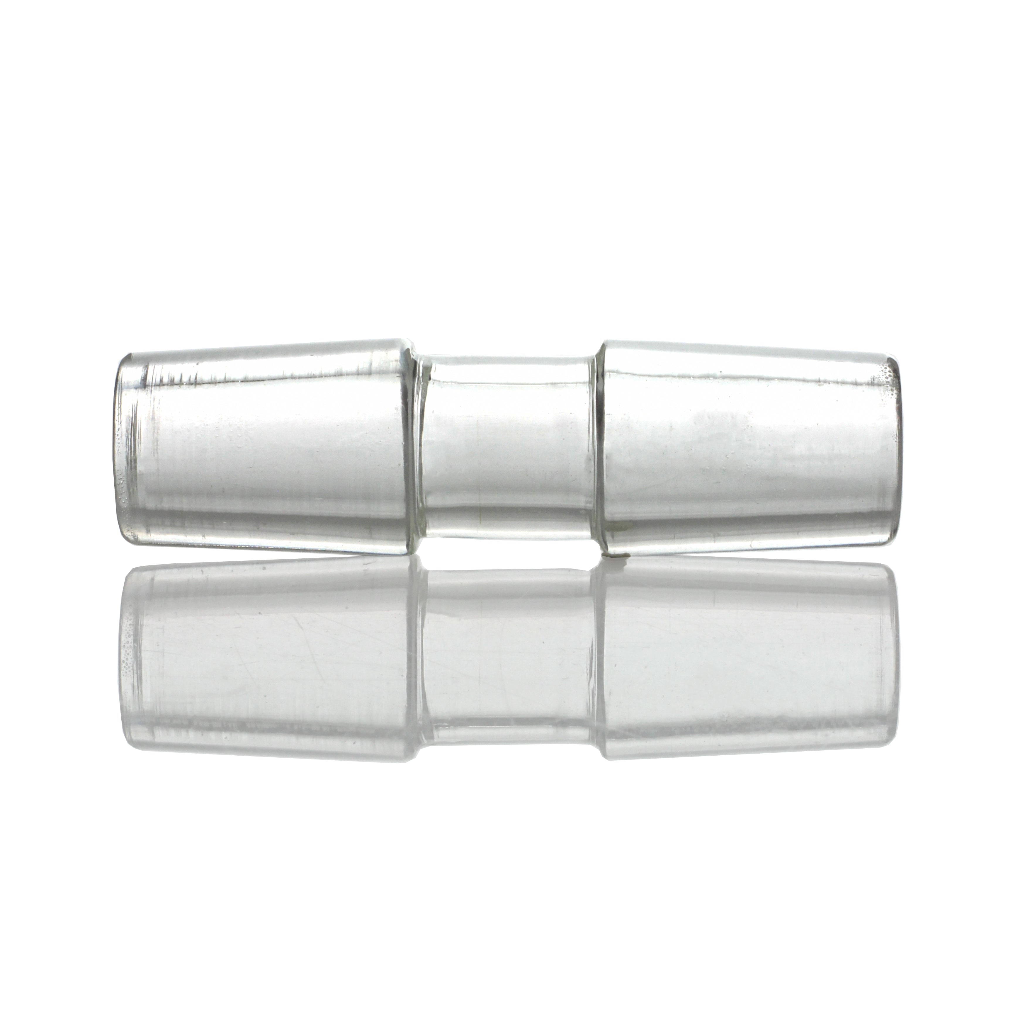 Top-down close-up of the transparent Sleek And Simple Male To Male Adapter showing three cylindrical joined sections and their reflection.