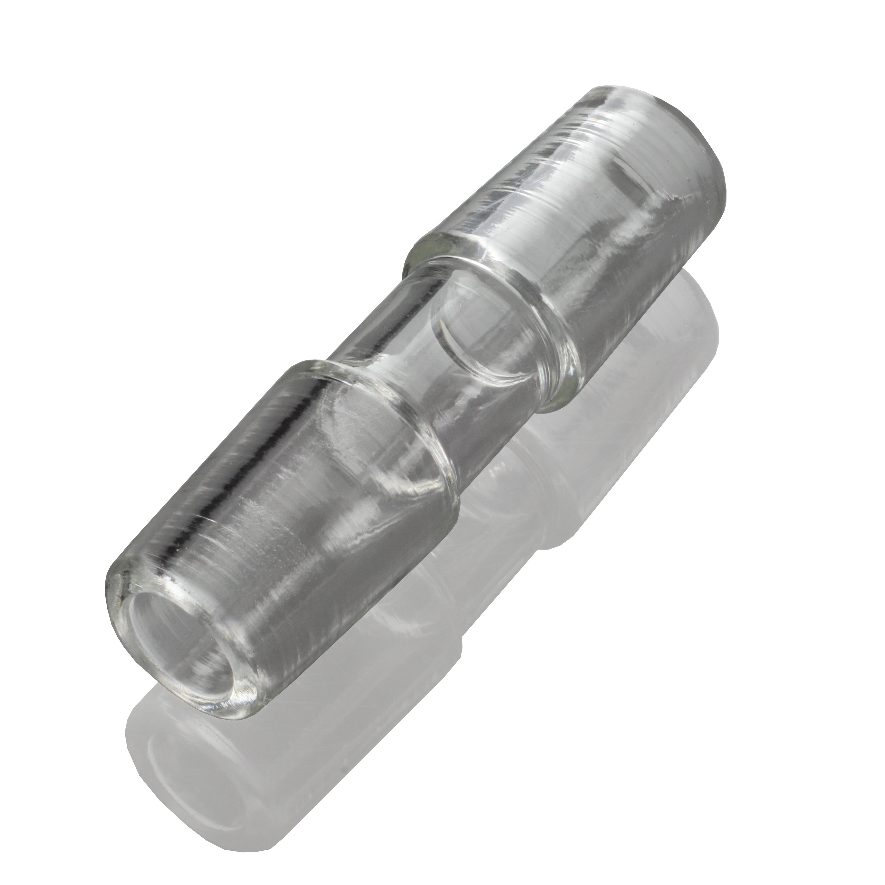 Angled close-up of a clear glass Sleek And Simple Male To Male Adapter showing the smooth cylindrical body and reflective shadows