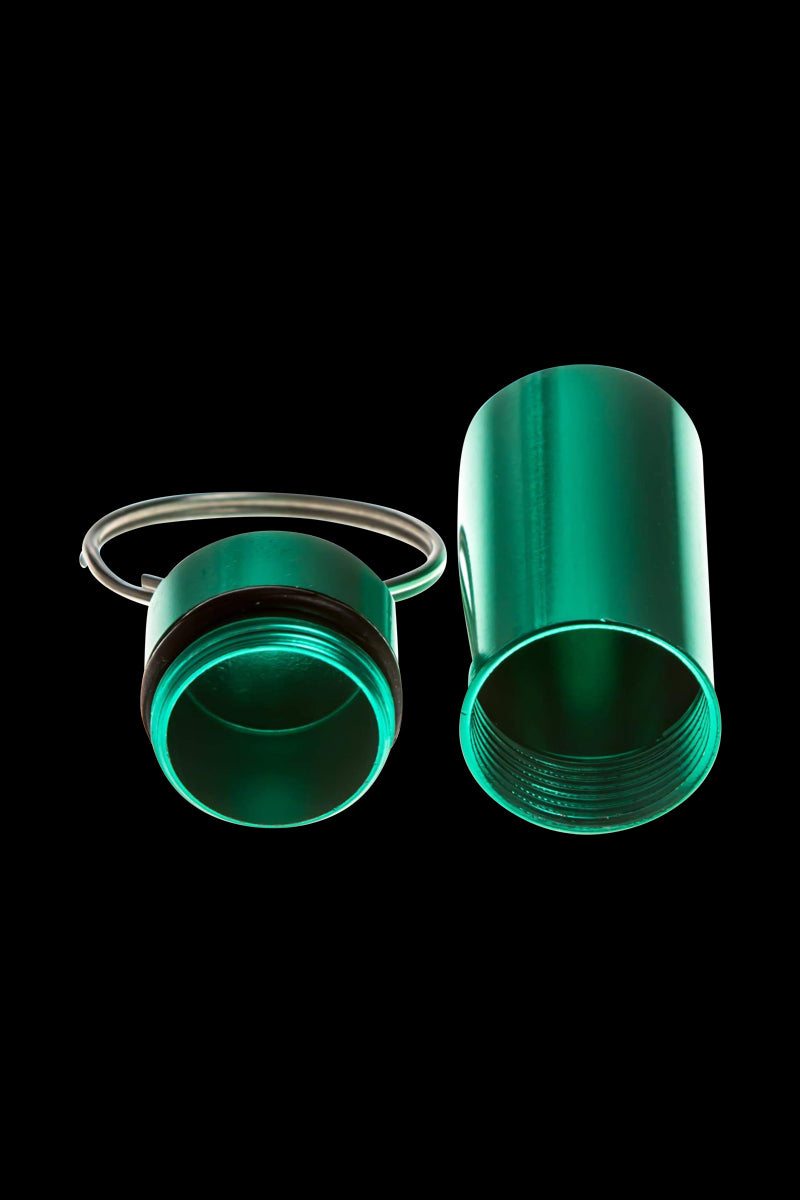 A close-up, angled view of the Discrete Key Chain Stash Jar, a small, cylindrical container on a black background.