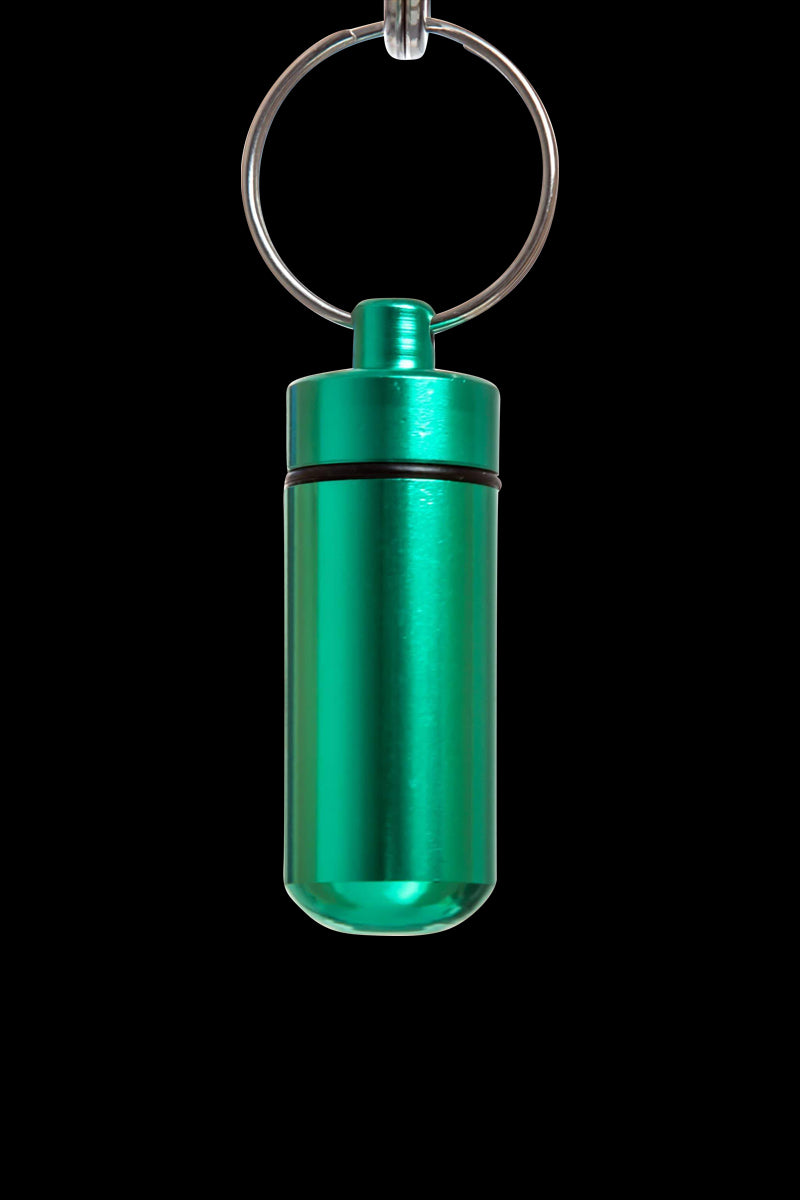 Front view of the Discrete Key Chain Stash Jar, a silver, cylindrical container with a key chain loop.