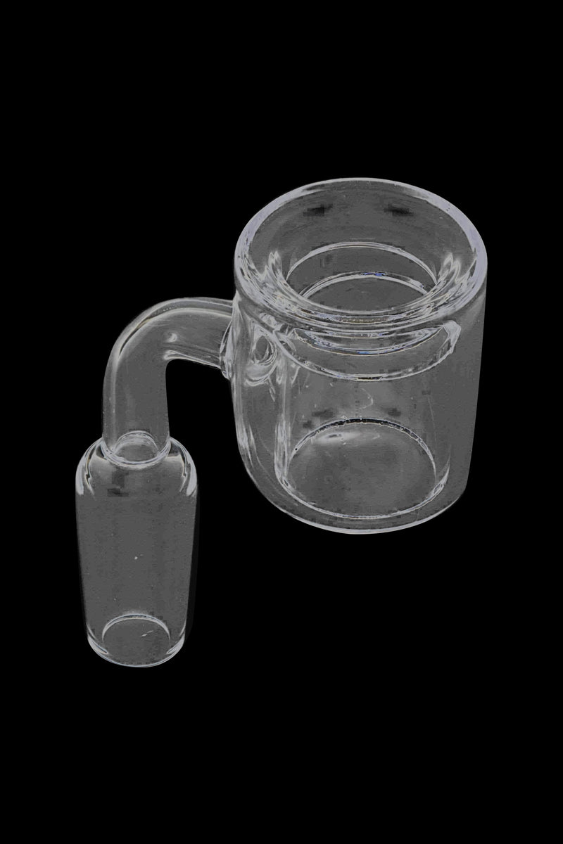 Top-down close-up of a clear Thermal Chamber Quartz Banger Nail against a black background, showing its bucket and angled stem