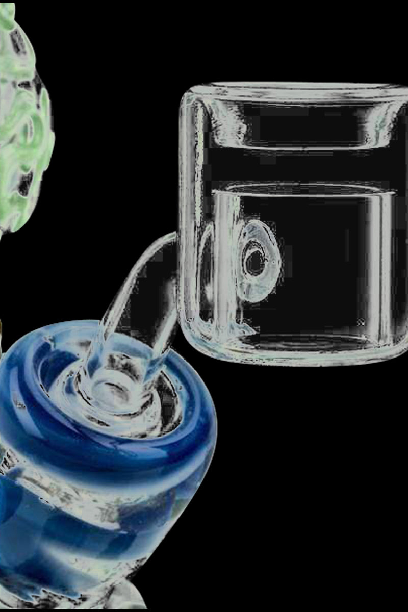Close-up on a glass Thermal Chamber Quartz Banger Nail showing its tilted joint and hollow chamber against a black background.