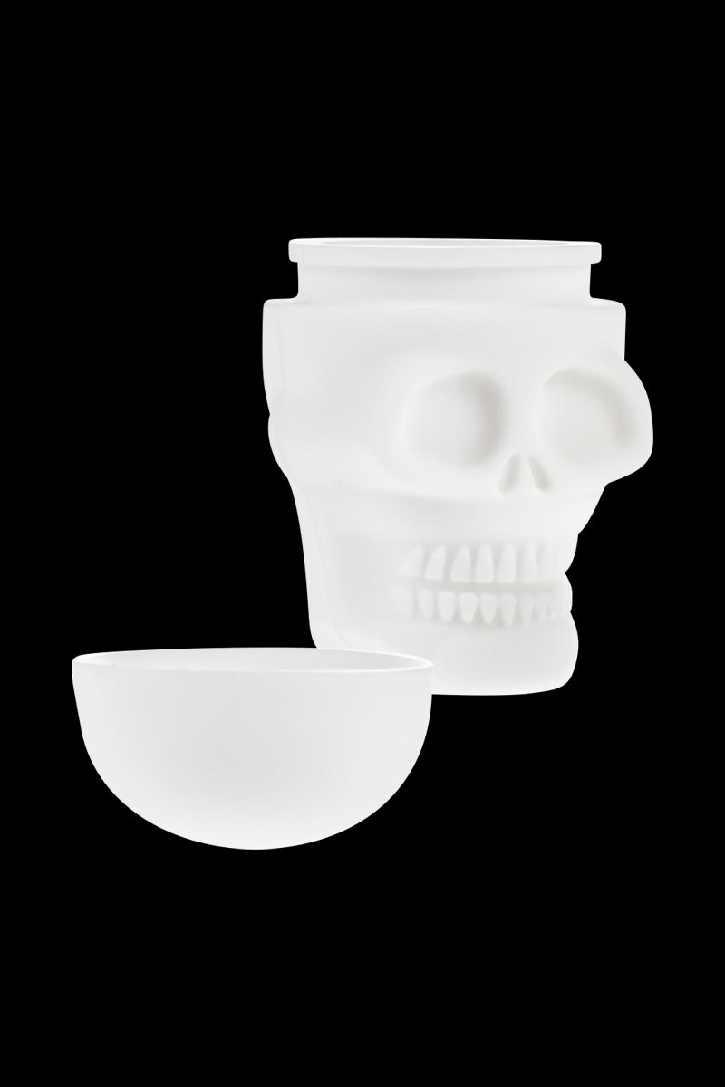 A side view of the Silicone Non-Stick "Skull" Stash Container, showing its open lid and smooth, dark interior.