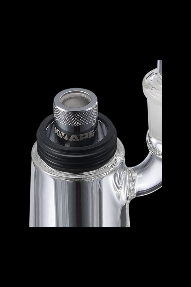 Close-up of the XVAPE Vista Mini 2 Electronic Dab Rig with a textured, silver-colored top and transparent body.