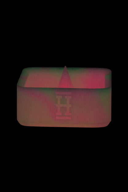 Neon red and green cannabis storage container.