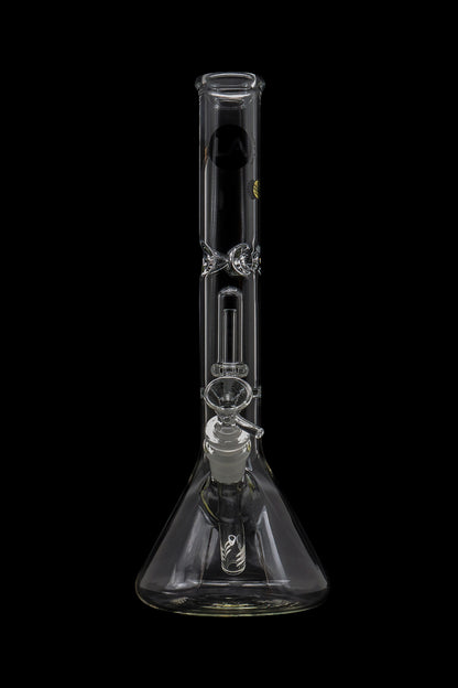 Clear glass bong with intricate percolators, isolated on a black background.