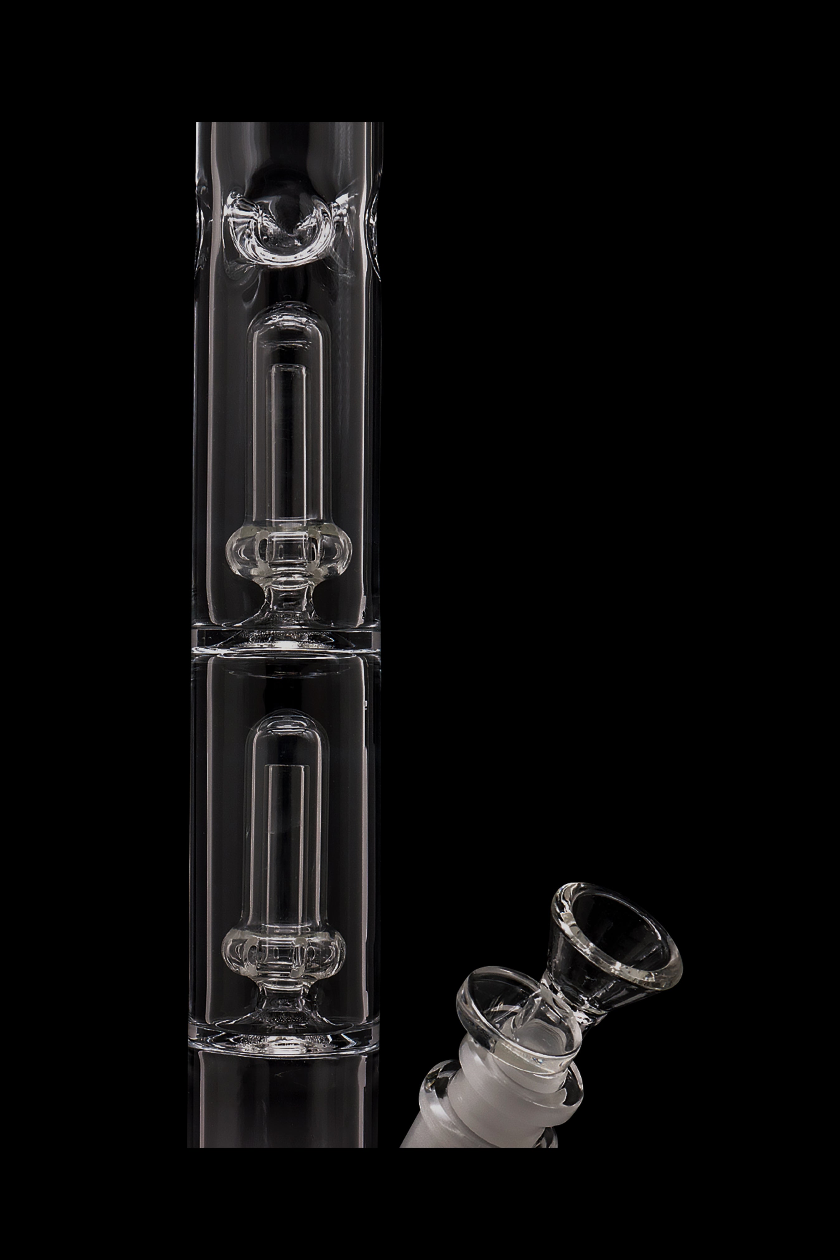 Clear glass bubbler with a separate glass bowl piece, isolated on a black background.
