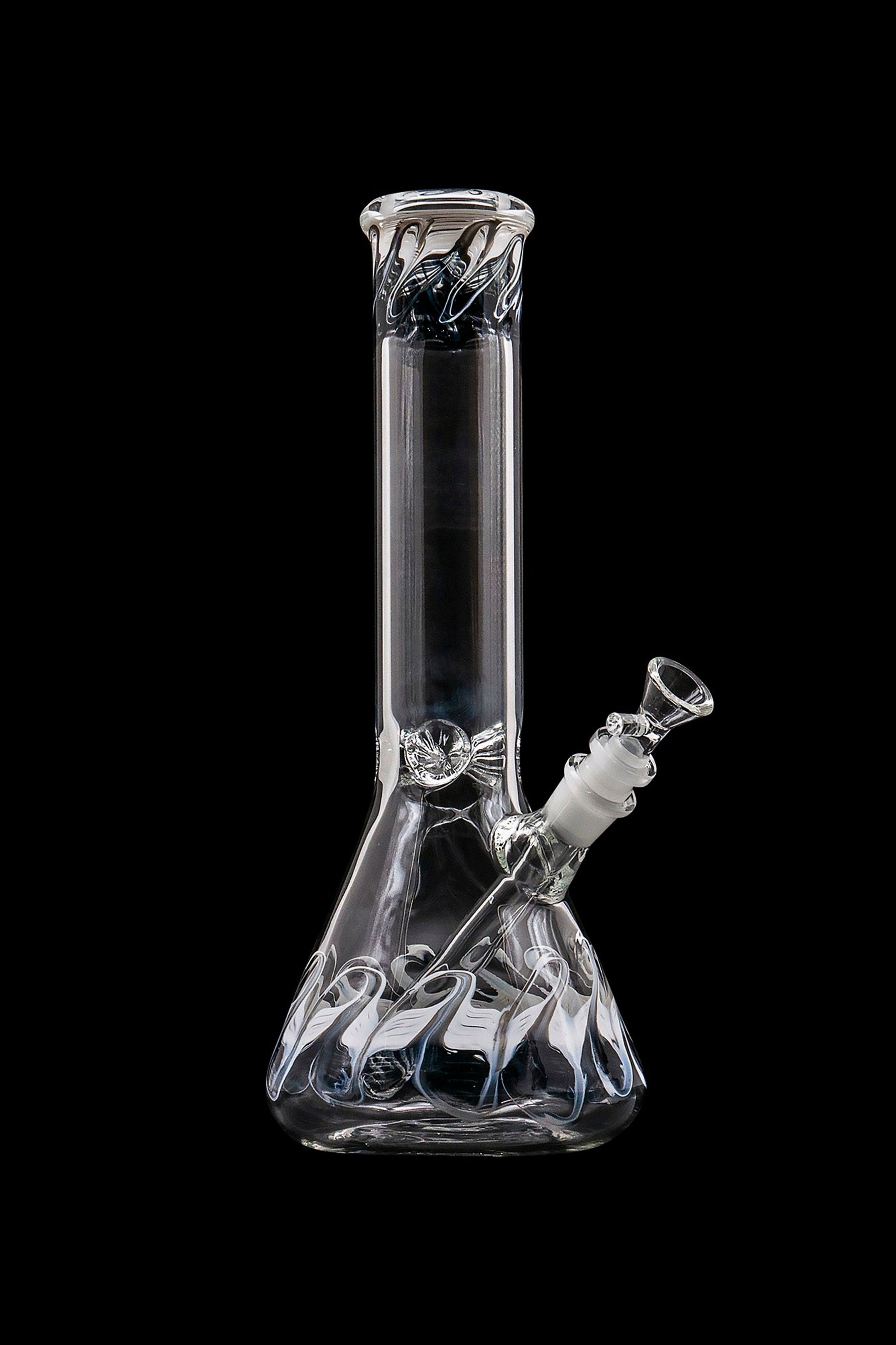 Clear glass water pipe (bong) with intricate swirling designs, isolated on a black background.