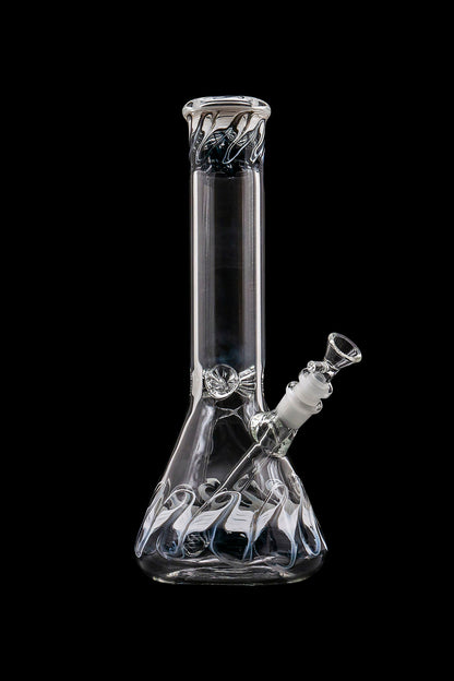 Clear glass water pipe (bong) with intricate swirling designs, isolated on a black background.