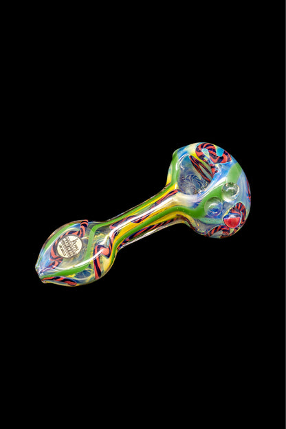 Colorful glass smoking pipe on a black background.