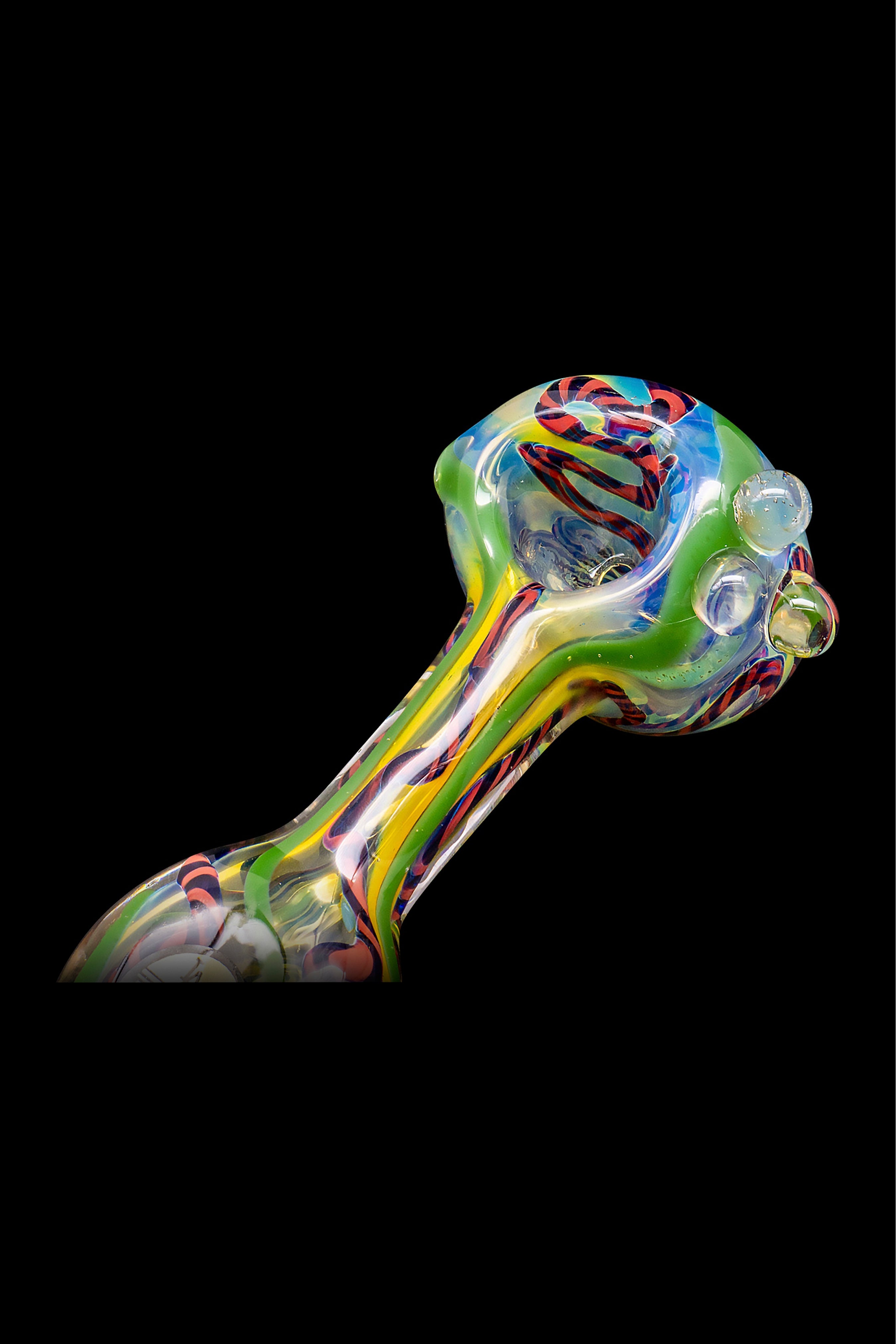 Hand-blown glass pipe with colorful swirls and bubble accents, isolated on black.