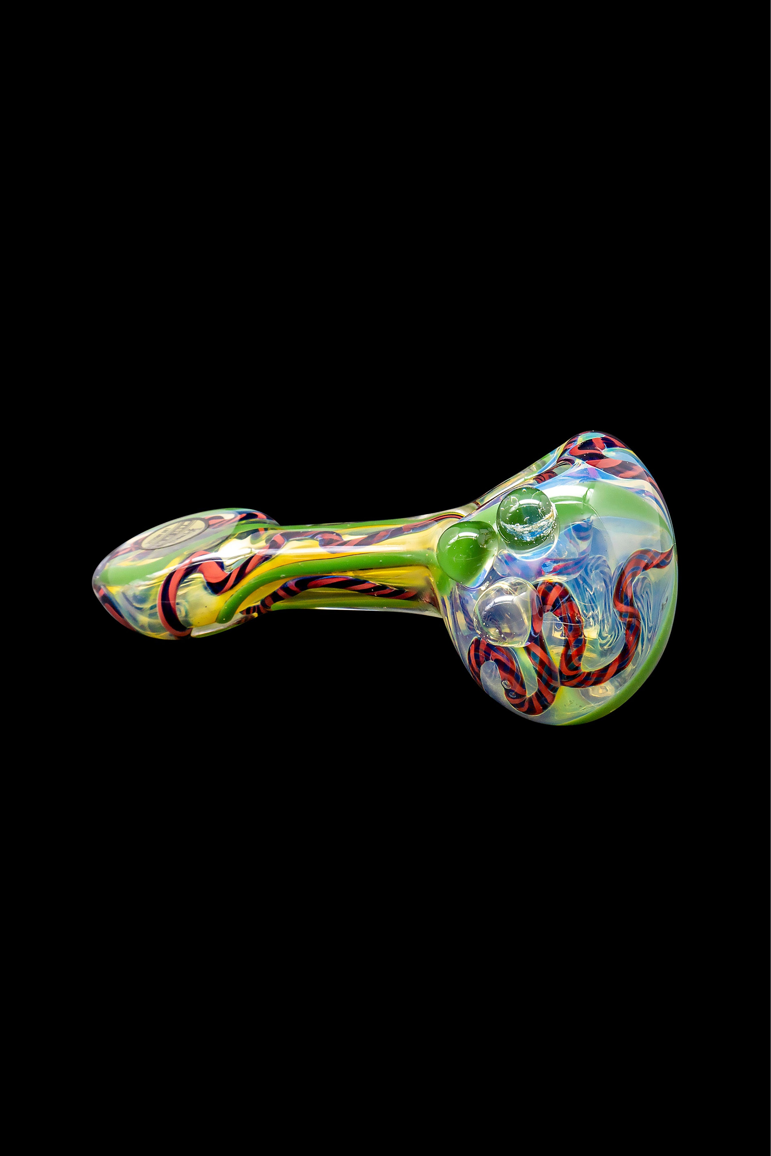 Colorful glass pipe with intricate swirling patterns against a black background.