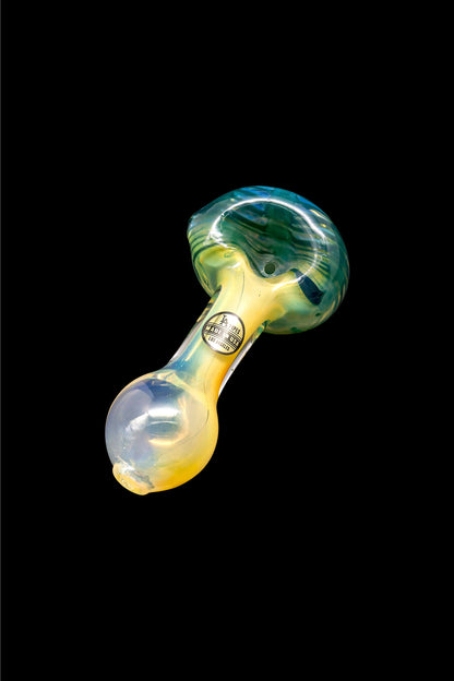 Glass pipe with swirling iridescent colors against a black background.