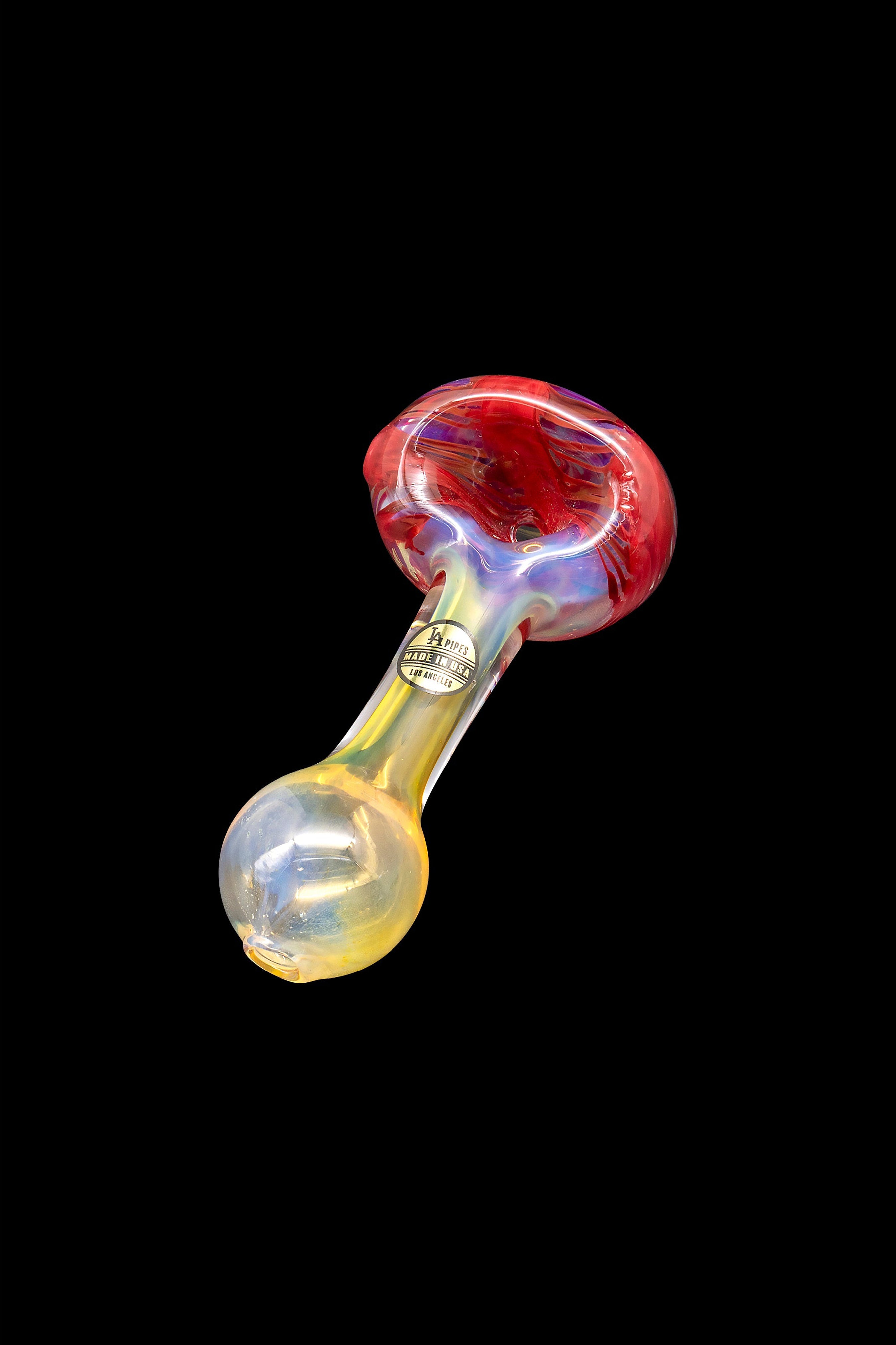 Glass pipe with red and iridescent swirls, against a black background.