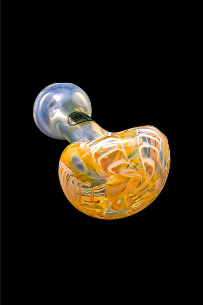 Hand-blown glass cannabis water pipe with swirling orange and blue patterns.
