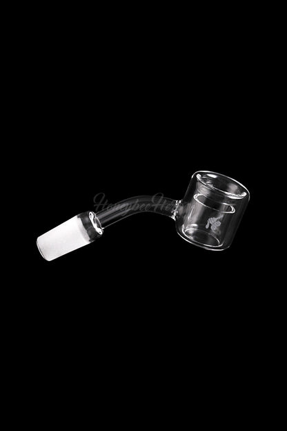 Clear glass cannabis oil rig banger with a frosted joint.