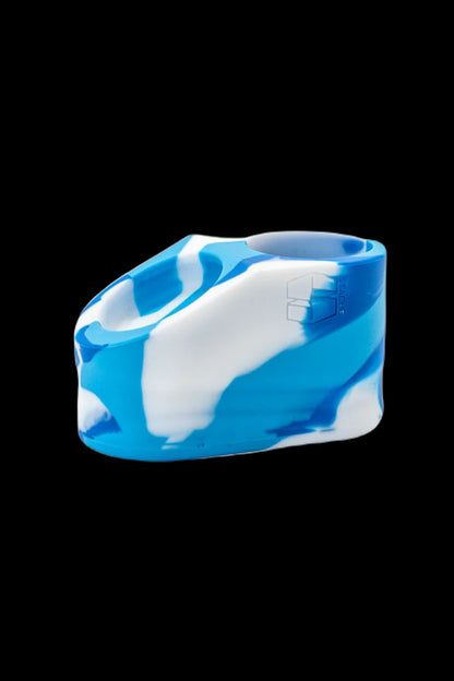 Blue and white silicone cannabis concentrate container.