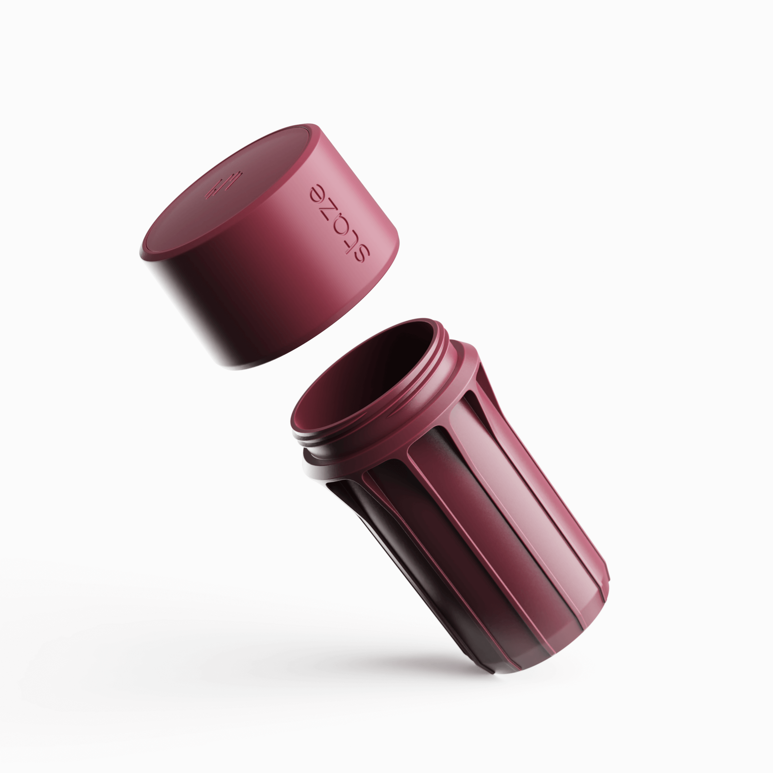Angled close-up of the brick-colored STAZE PRESERVE showing its threaded opening and embossed lid hovering above the cylindrical body.