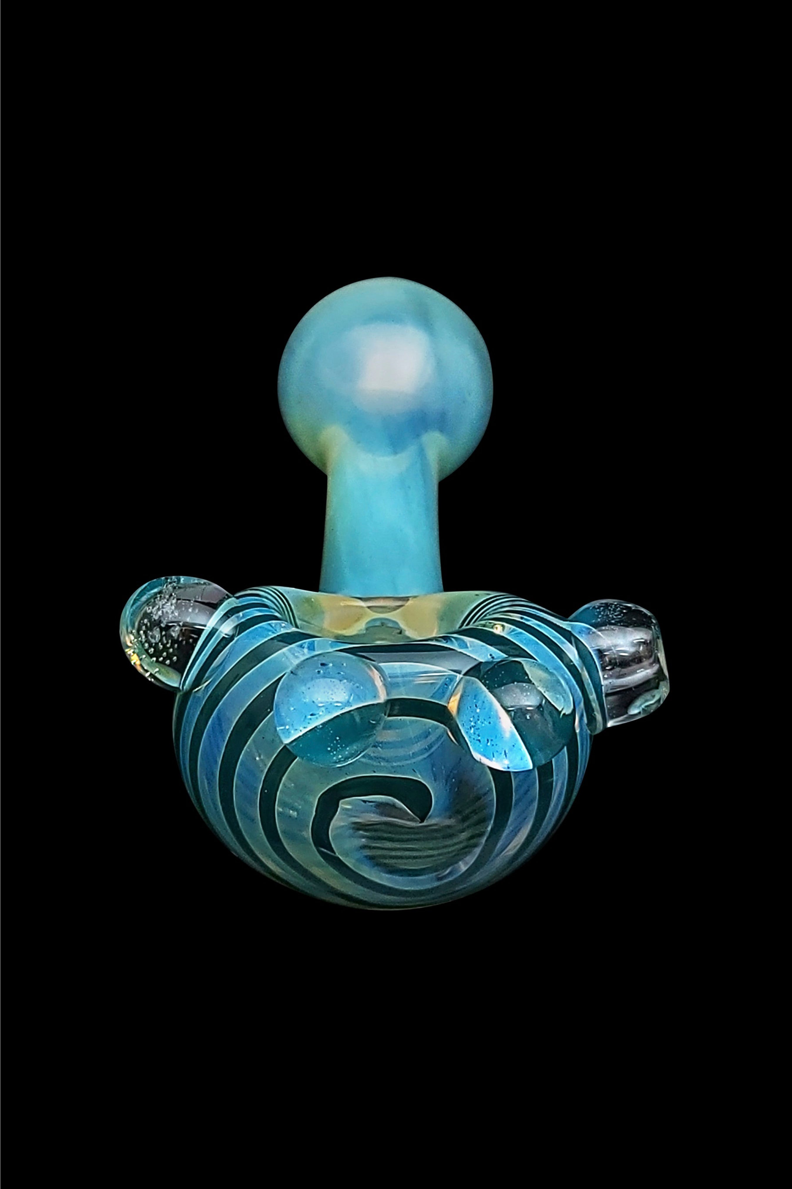 Blue glass cannabis oil rig with swirling patterns.