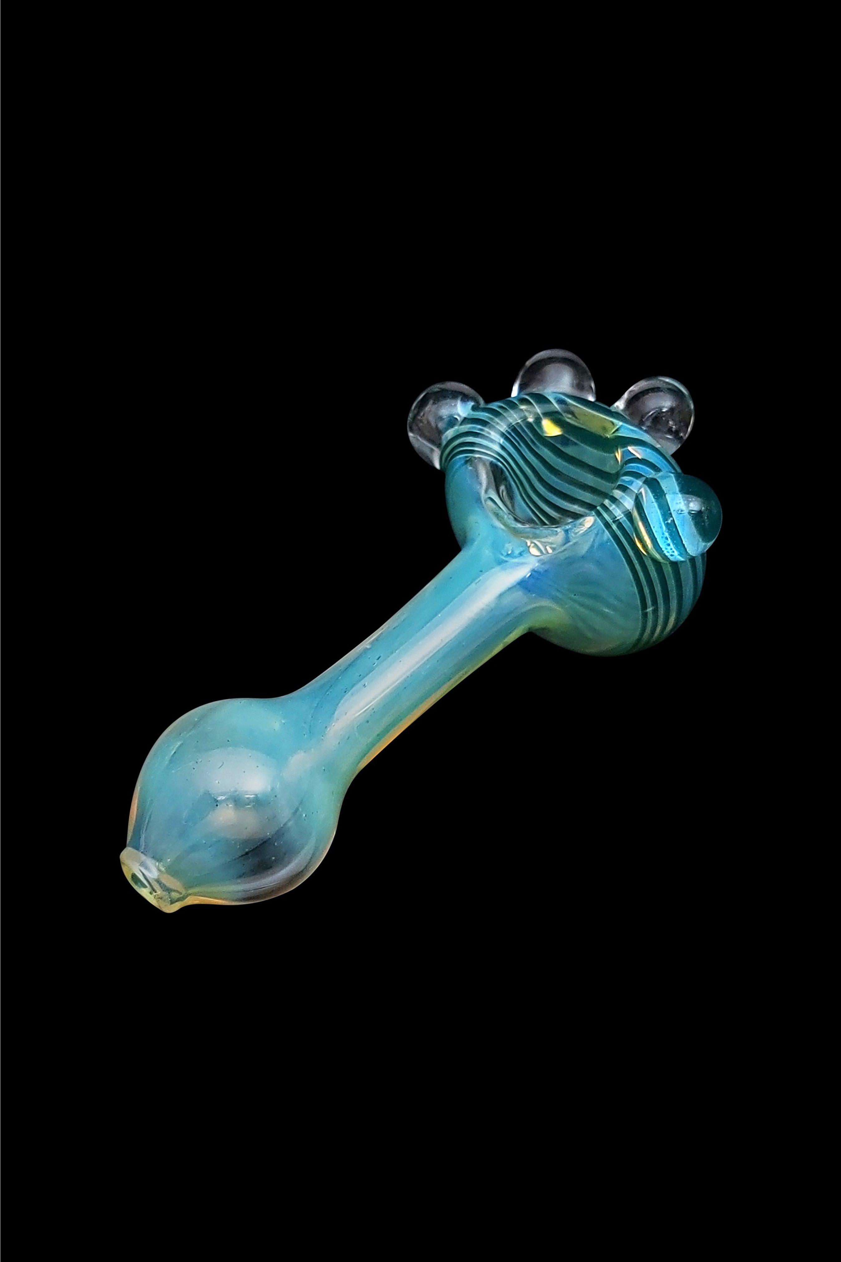 Blue glass pipe with bubbles, isolated on black.