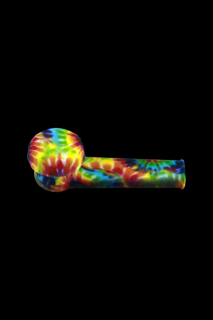 Colorful silicone smoking pipe on a black background.