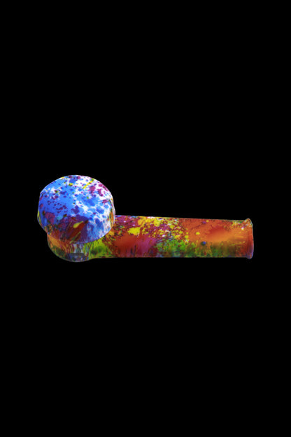 Colorful glass pipe on a black background.