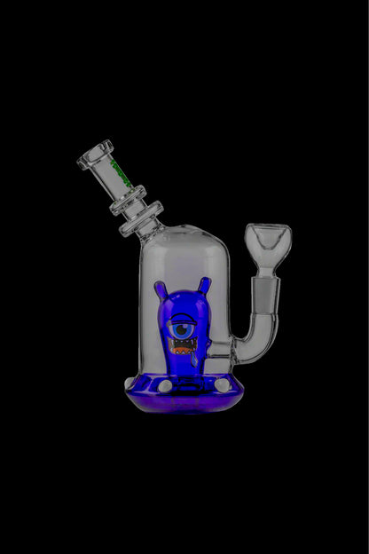 Blue glass water pipe with a monster-themed design.