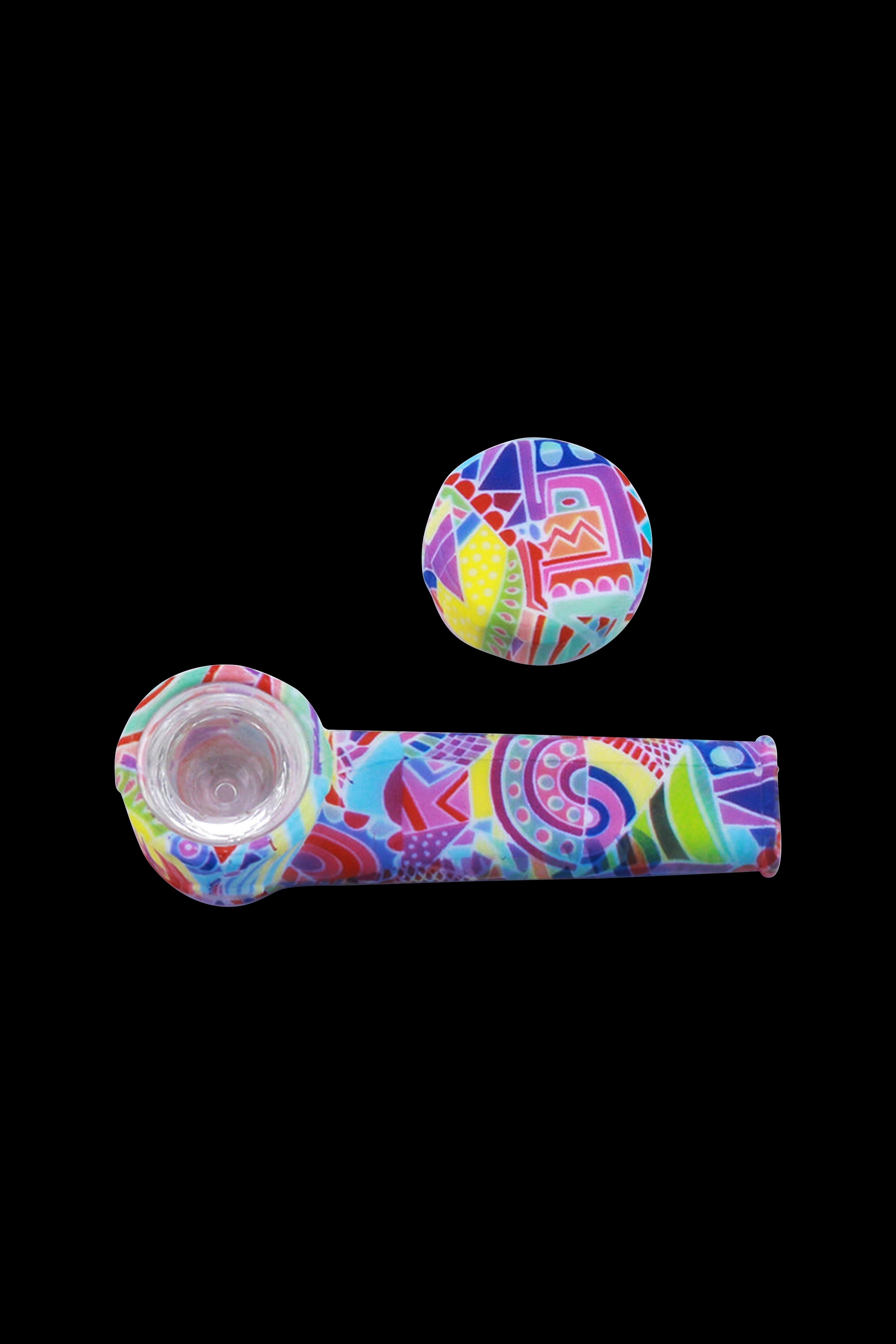 Colorful glass pipe and mouthpiece set against a black background.