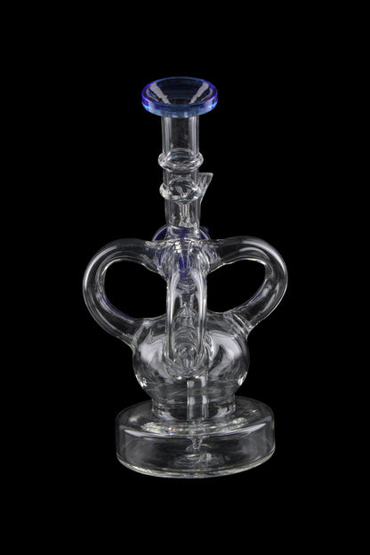 Clear glass dab rig with blue accents, isolated on a black background.