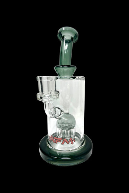Clear glass bubbler water pipe with green accents and a red logo, isolated on a black background.